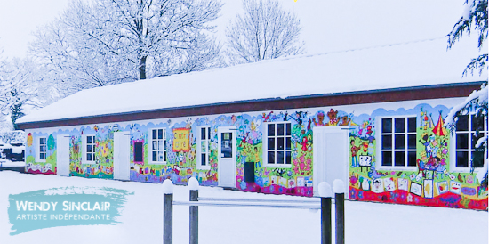 Wendy Sinclair painted this mural on the exterior of this holiday club in Hambye, Normandy